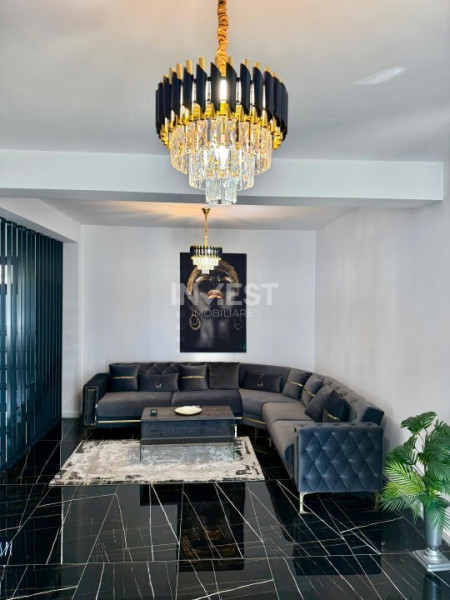 Vilă de vânzare cu design deosebit în cartierul Bucium