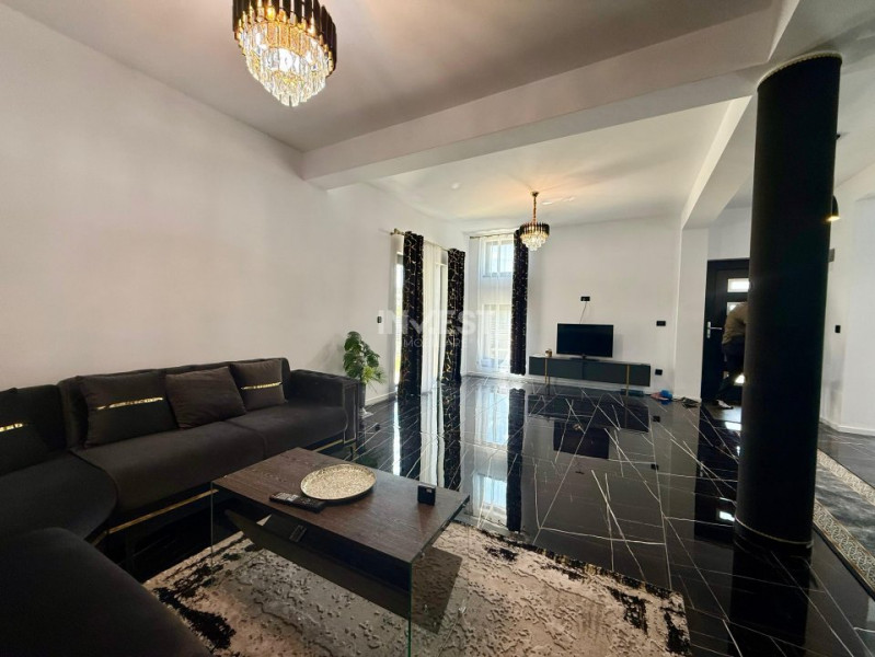 Vilă de vânzare cu design deosebit în cartierul Bucium