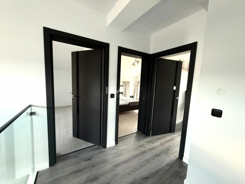 Vilă de vânzare cu design deosebit în cartierul Bucium