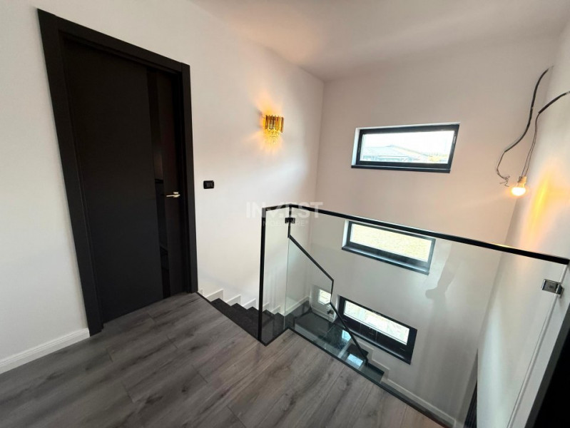 Vilă de vânzare cu design deosebit în cartierul Bucium