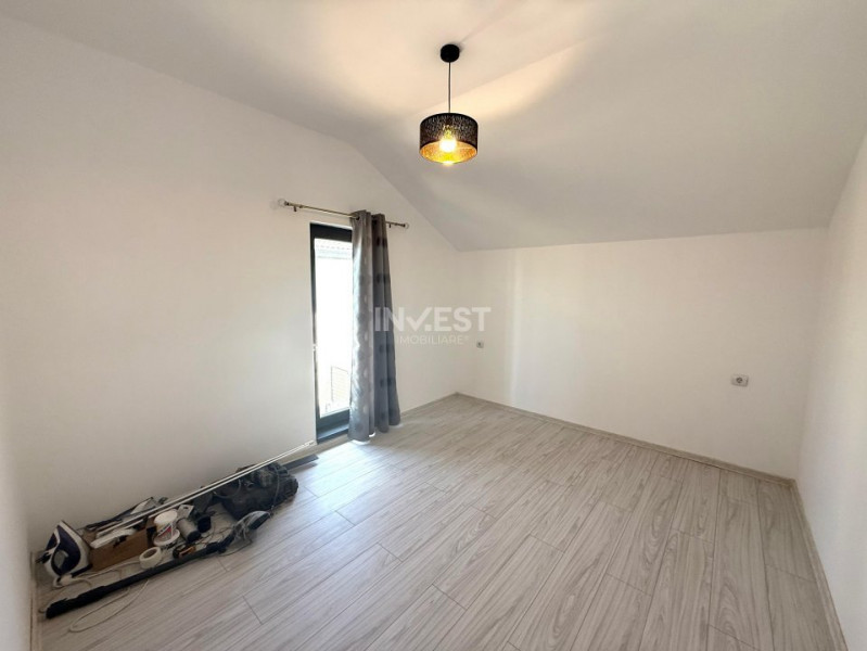 Vilă de vânzare cu design deosebit în cartierul Bucium