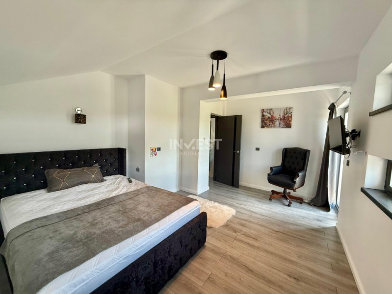 Vilă de vânzare cu design deosebit în cartierul Bucium
