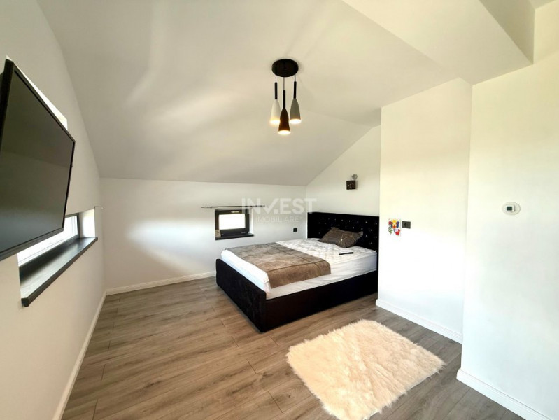 Vilă de vânzare cu design deosebit în cartierul Bucium