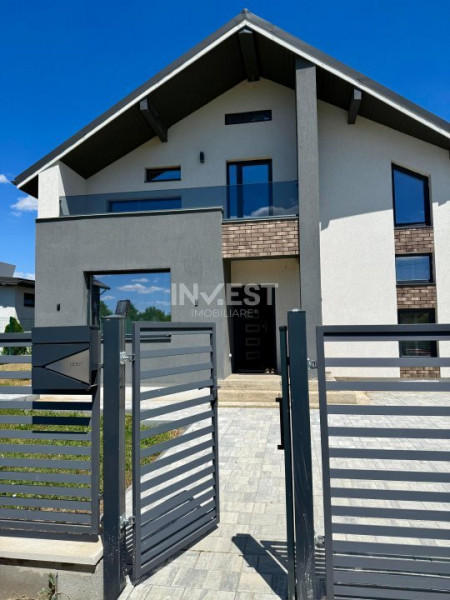 Vilă de vânzare cu design deosebit în cartierul Bucium