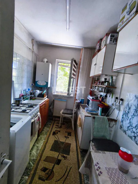 Apartament 2 camere-etaj 1-bloc fara risc-Podu Ros