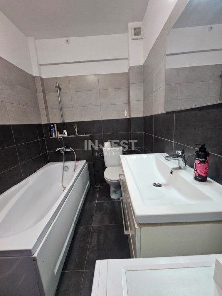 APARTAMENT 2 CAMERE DECOMANDAT, CURTE 42 MP CU LOC DE PARCARE INCLUS IN PRET