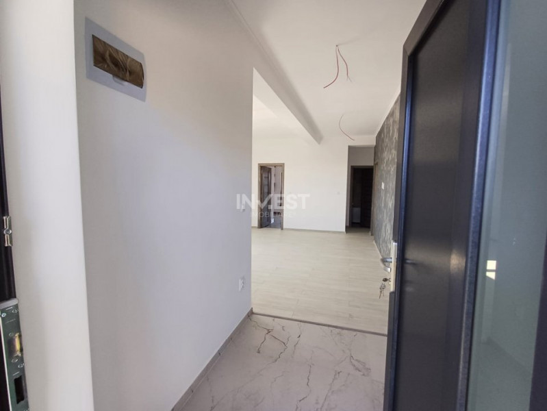 Casă cu 4 camere, 2 băi, beci spațios și 400 mp teren