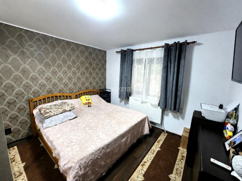 Apartament 2 camere decomandat, parter înalt, Podu Iloaiei – zonă centrală