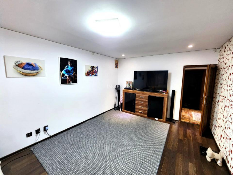 Apartament 2 camere decomandat, parter înalt, Podu Iloaiei – zonă centrală