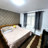 Apartament 2 camere decomandat, parter înalt, Podu Iloaiei – zonă centrală