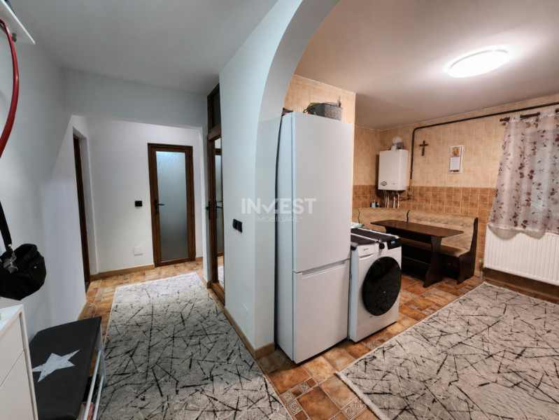 Apartament 2 camere decomandat, parter înalt, Podu Iloaiei – zonă centrală