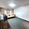 Apartament 2 camere decomandat, parter înalt, Podu Iloaiei – zonă centrală